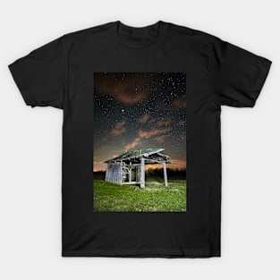 Shack on a meadow at night T-Shirt